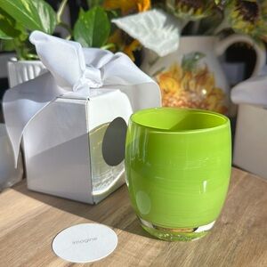 Vibrant green glassybaby “imagine” glass votive.